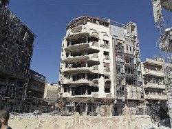 Amid the ruins in Homs, Syrian anger burns