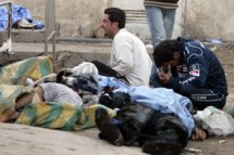 Toll rises in Baghdad market blasts