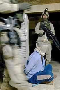 UN Pulls Foreign Staff from Baghdad as US Troops Hunt Saddam Official