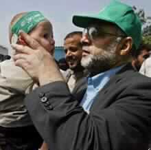 Pressure Mounts on Sharon over Bribes as Hamas Calls Bush "Enemy of Islam"