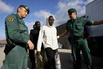 Spain to Legalize Immigrants